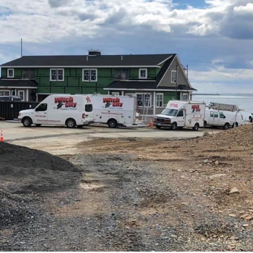 Witch City Plumbing trucks on the job